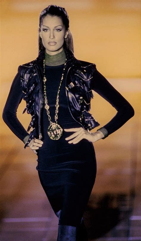 The Meaning Behind Gianni Versace's Fashion .